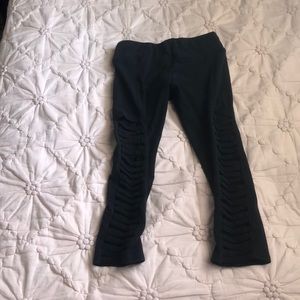 Black capri leggings with patterned sides